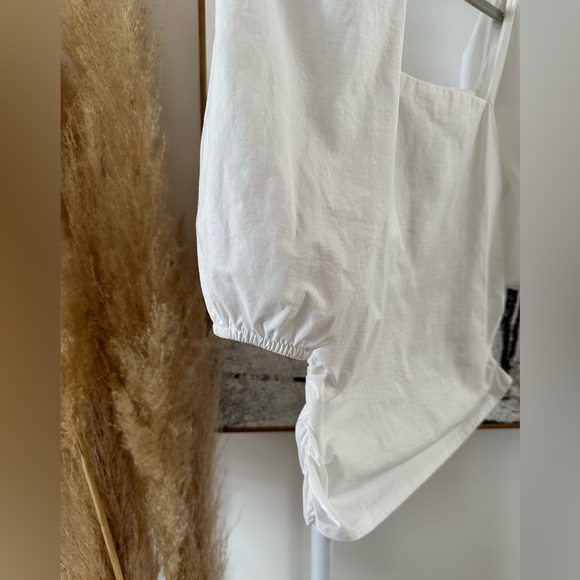 Crisp white top from Zara in size small. Stretchy, square neck, puff sleeves. - Picture 6 of 13